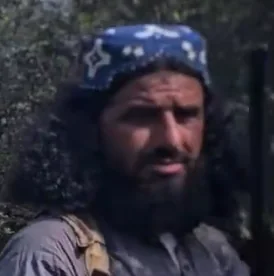 The man captioned as Ahmad Kazim at 0:33, blue cap