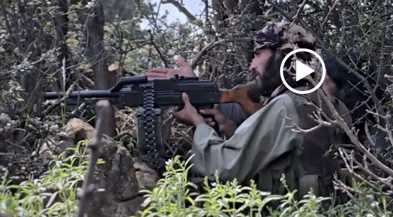 Frame at 03:03: PK-series machine gun in a firing position